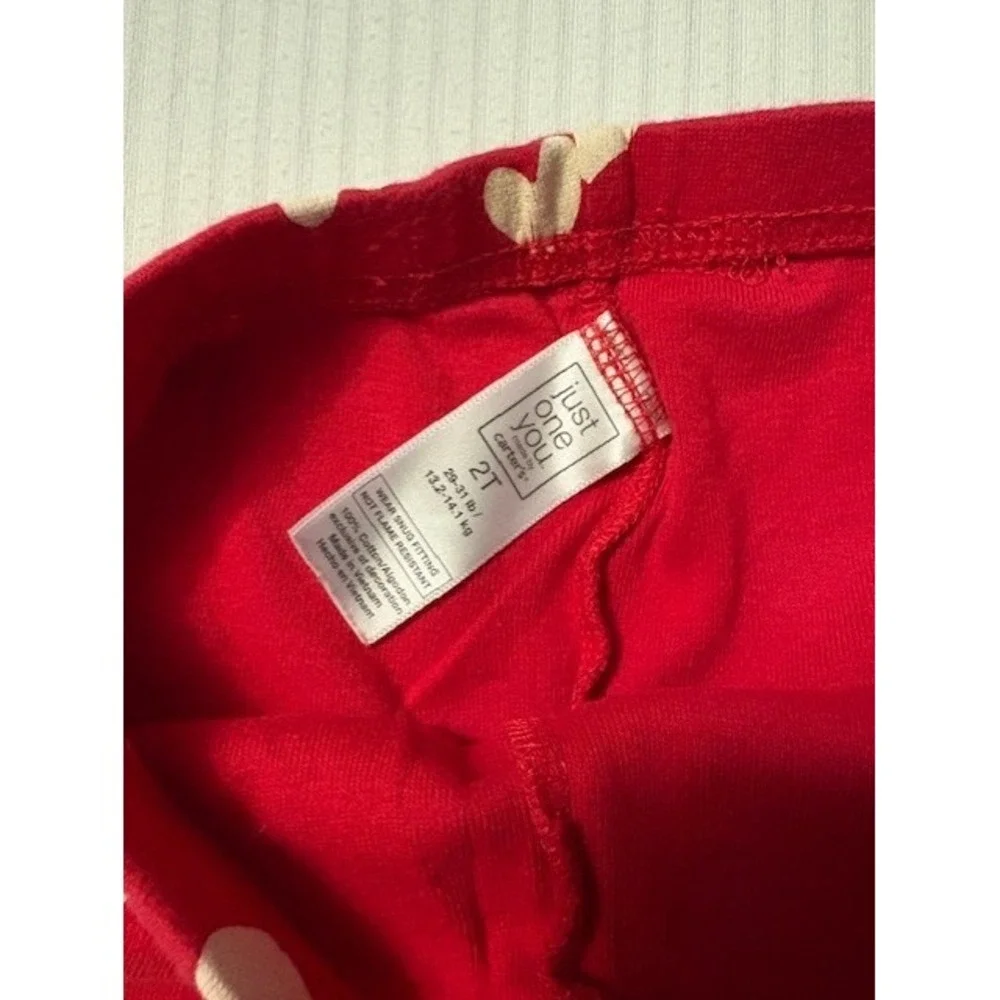 Carters size 2T 2 piece pajama set, red with white hearts and blue border